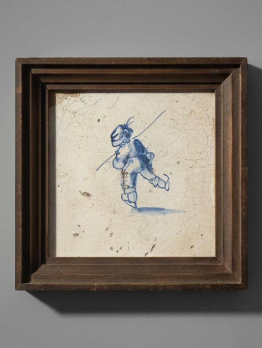 Atlas & Arden 17th-century Dutch Delft tile featuring a hand-painted blue pikeman in a dark wood stepped frame.