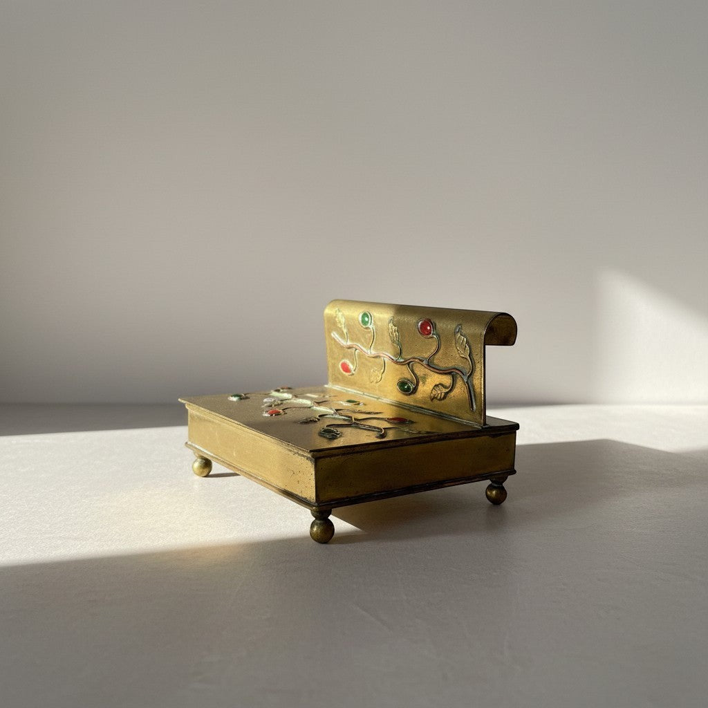 Atlas & Arden vintage brass box with ornate vine design, red and green stones, and ball feet. Mid-century desk organizer.