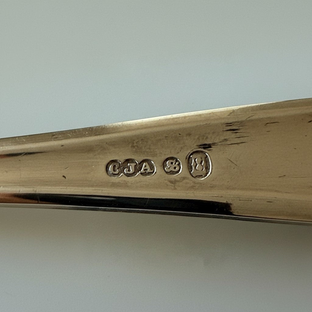 Atlas & Arden Cased Sterling Silver Tea Set, Glasgow. Close-up of hallmarks on a teaspoon.