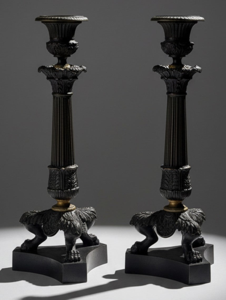 Pair of Atlas & Arden Charles X patinated bronze candlesticks with fluted columns and lion paw feet, c. 1830.