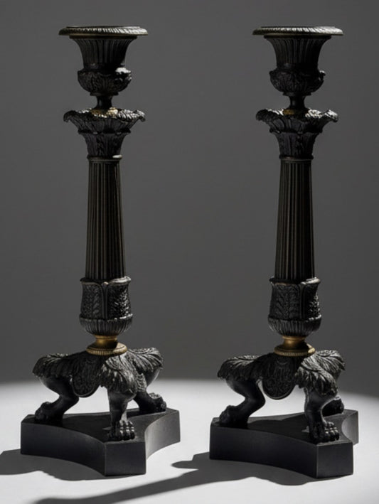Pair of Atlas & Arden Charles X patinated bronze candlesticks with fluted columns and lion paw feet, c. 1830.