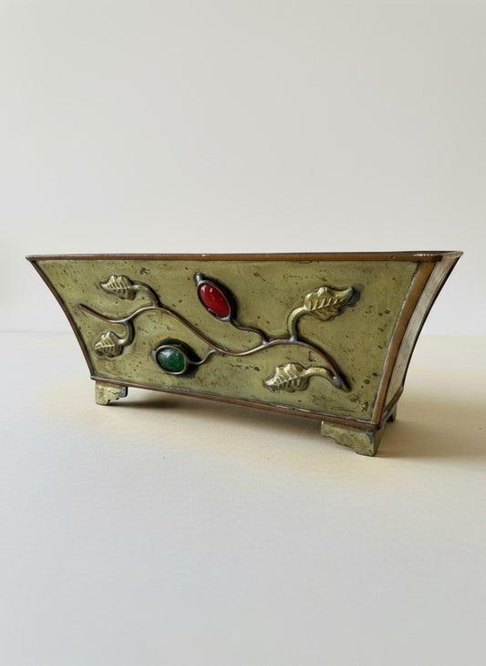 Atlas & Arden Chinese brass planter with vine motif and red/green cabochon stones, tapered rectangular form on bracket feet.