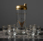 Atlas & Arden vintage Culver 22K gold Patriotic Eagle cocktail shaker set with six roly-poly glasses on marble table.