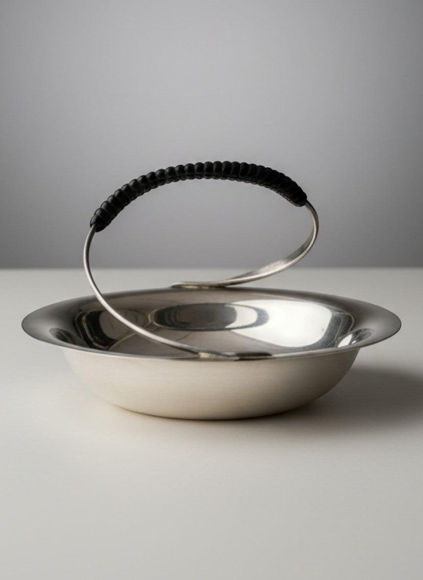 Atlas & Arden Danish silverplate catchall dish with a dark wrapped handle, mid-century design.