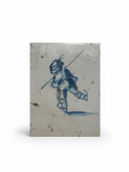 Atlas & Arden 17th-century Dutch Delft tile featuring a hand-painted blue and white ice skater with aged crazed glaze.