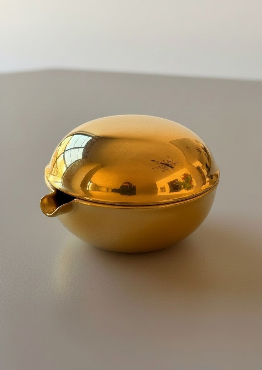 Atlas & Arden gold lustre porcelain ashtray, hand-painted by Augarten Wien. Small, round dish with a lid and a small spout.