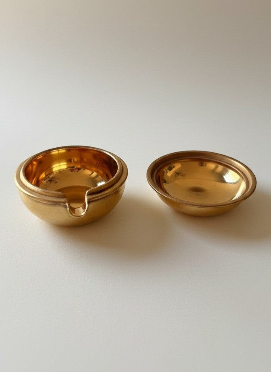 Atlas & Arden gold lustre porcelain ashtray, hand-painted by Augarten Wien. Small, round, and fully gilded inside and out.