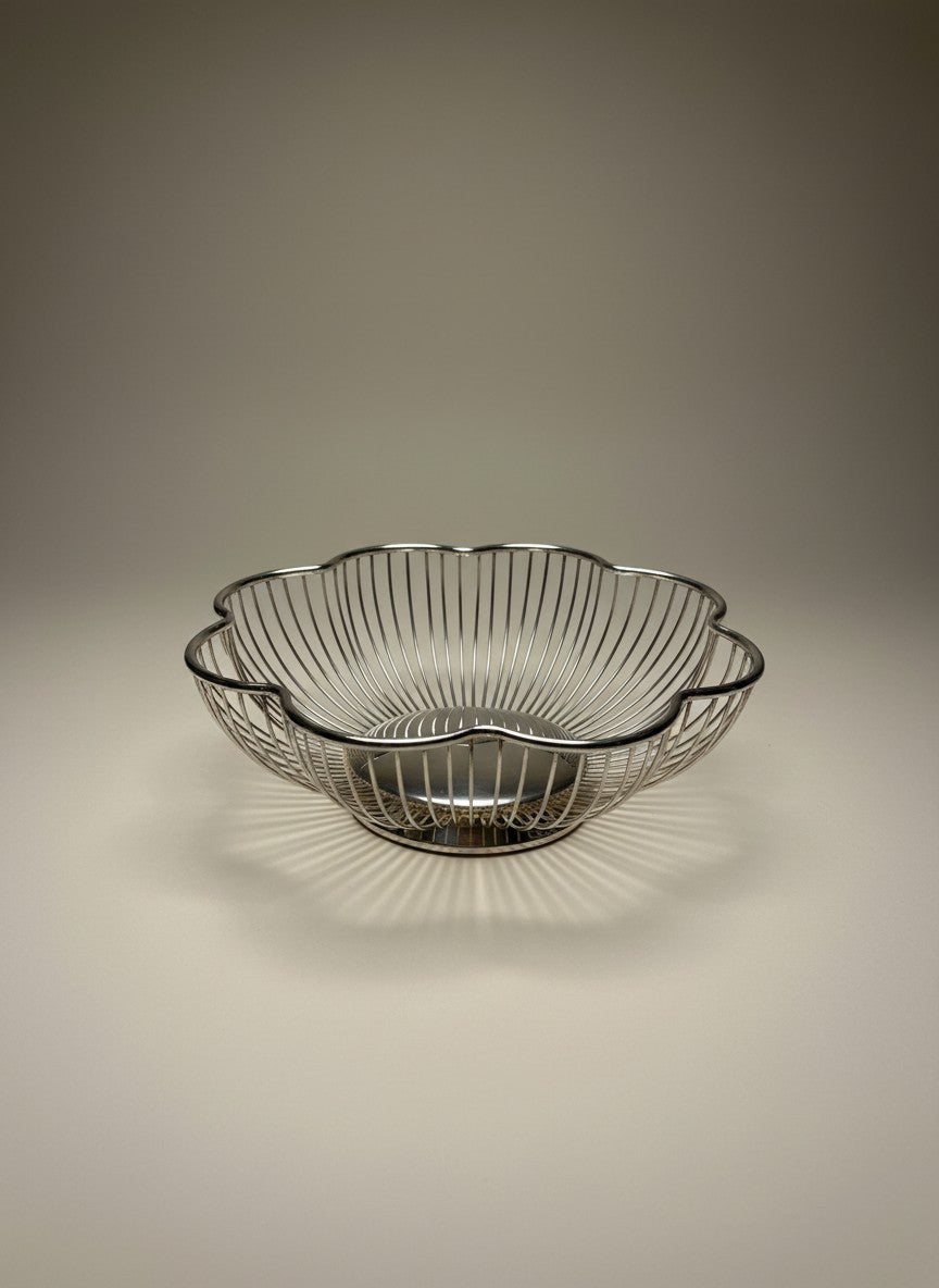 Atlas & Arden Italian silverplate wire basket with scalloped petal form and a solid round base, mid-20th century.
