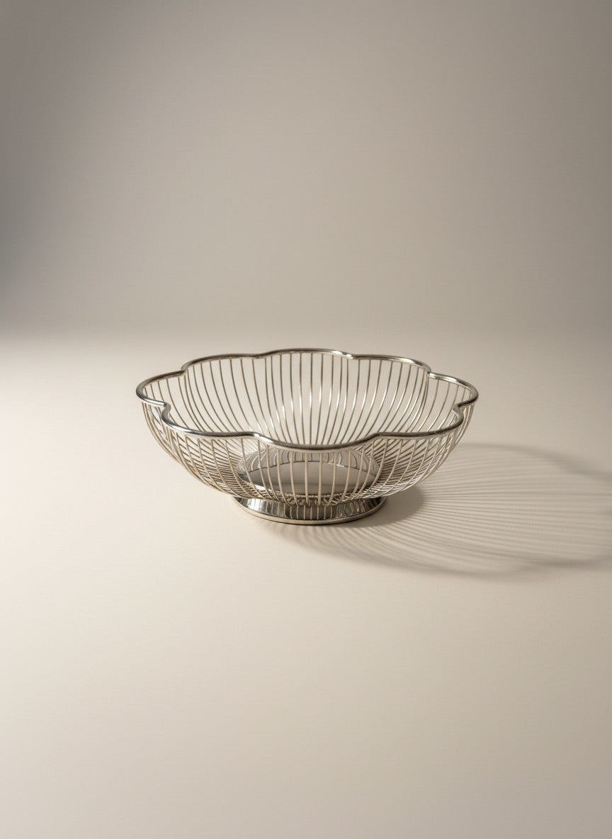 Atlas & Arden Italian silverplate wire basket with scalloped petal form and solid base, mid-20th century.