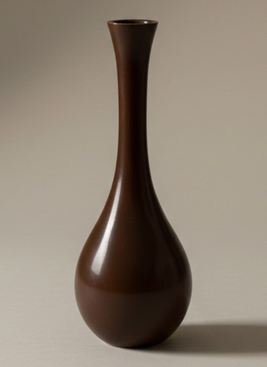 Atlas & Arden Japanese bronze tsuru-kubi bud vase, mid-20th century. Deep brown with reddish undertones and subtle vertical fluting.