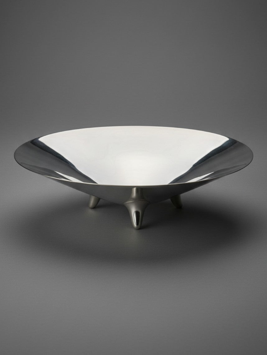 Atlas & Arden vintage Reed & Barton silverplate modernist footed bowl with a rounded-triangular shape and teardrop feet.