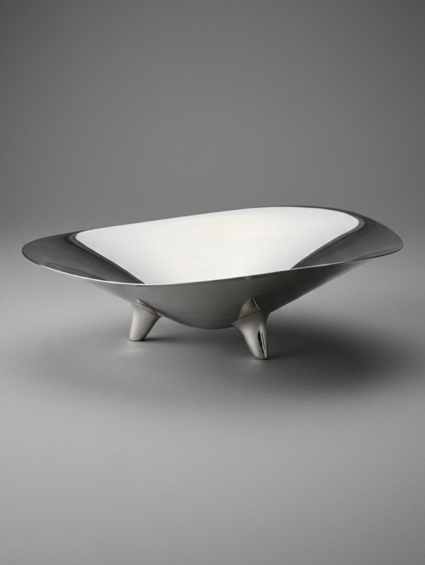 Atlas & Arden vintage Reed & Barton silverplate modernist bowl with teardrop feet and rounded triangular form.