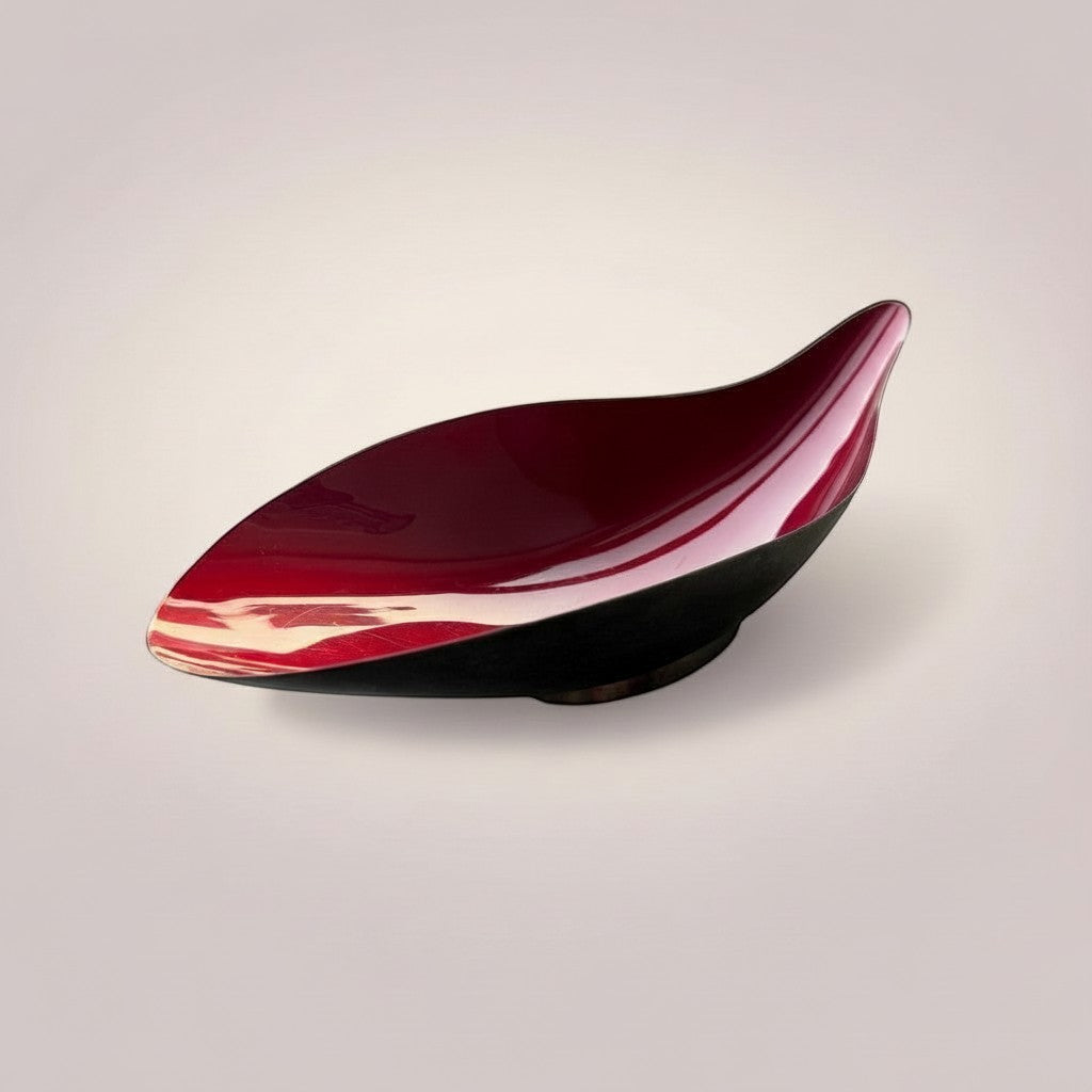 Atlas & Arden Reed & Barton mid-century modern leaf-shaped silverplate dish with crimson enamel interior and pedestal foot.
