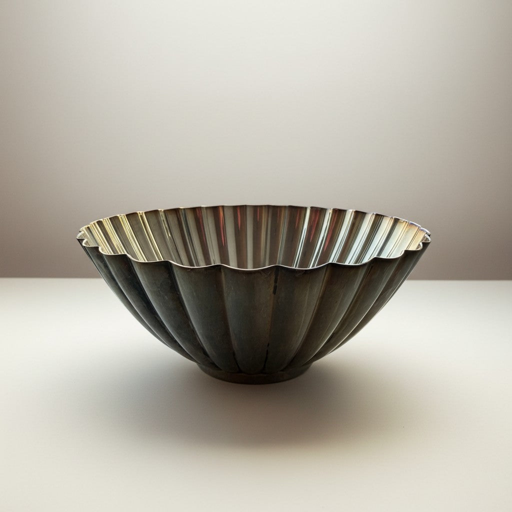 Atlas & Arden Reed & Barton silverplate bowl with radiating flutes and scalloped rim, pedestal foot. Mid-20th century.