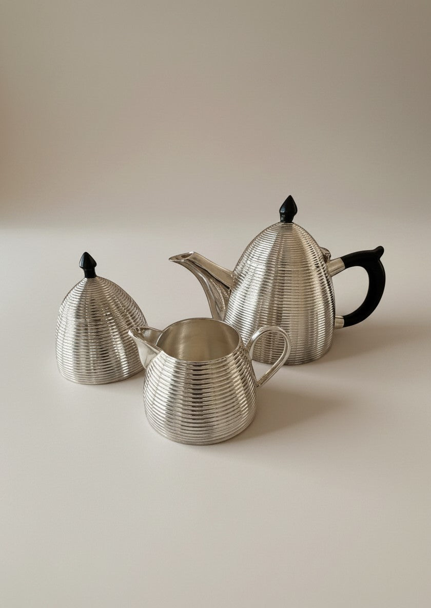 Atlas & Arden silver-plated three-piece tea service with ribbed beehive design and black Bakelite finials and handle.