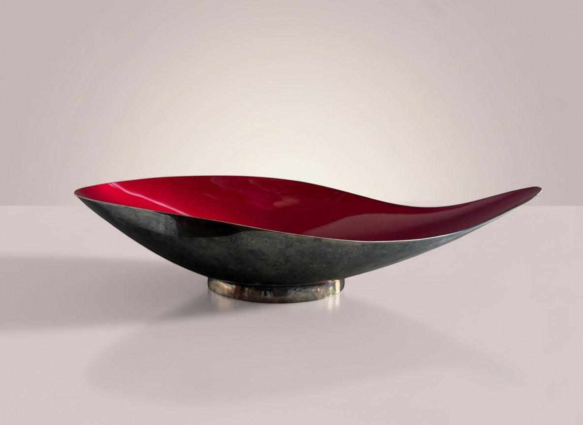 Atlas & Arden mid-century modern leaf-shaped silverplate dish with crimson enamel interior on a pedestal base.