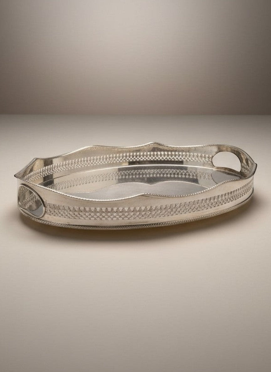 Atlas & Arden oval silverplate gallery tray with pierced rail, scalloped edge, beaded rim, cut-out handles, and ball feet.