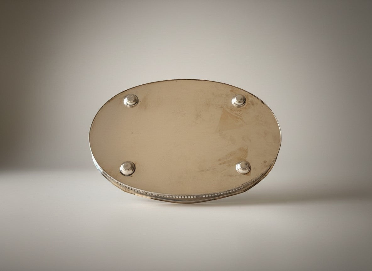 Atlas & Arden oval silverplate gallery tray with pierced rail, scalloped edge, beaded rim, cut-out handles, and ball feet.