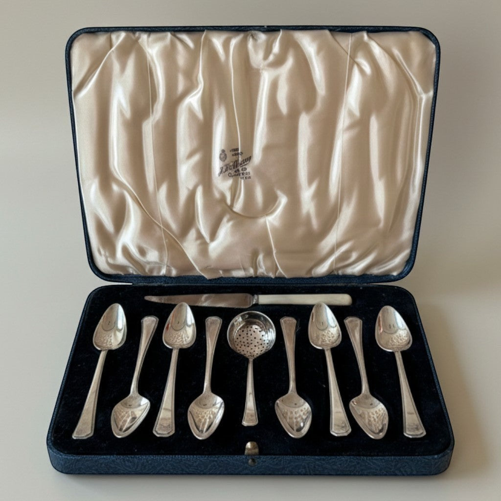 Atlas & Arden sterling silver tea set with eight teaspoons and a tea strainer in a fitted blue case. Classic Old English pattern.