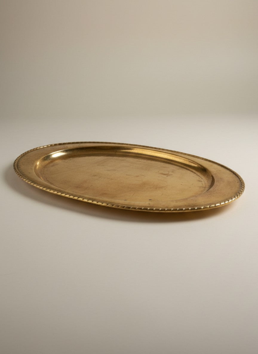 Atlas & Arden Ystad Metall brass serving platter with hammered finish and twisted rope rim, mid-20th century.