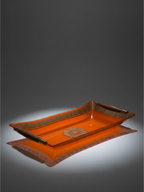 Georges Briard orange glass serving tray with gilt decoration, dark wood handles and brass-tone fittings, circa 1960s.